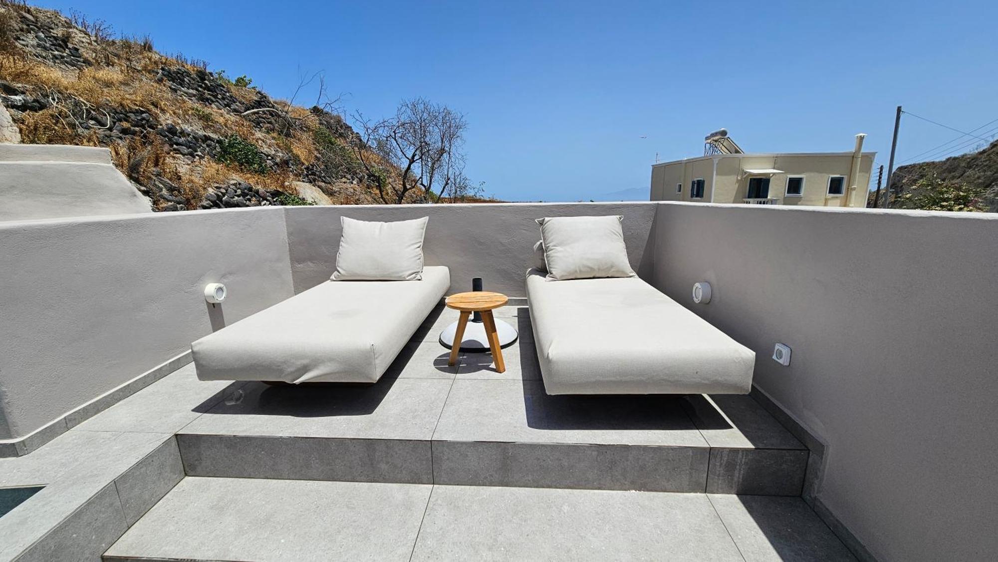 Petroma Cave Suites Vourvoulos Номер фото