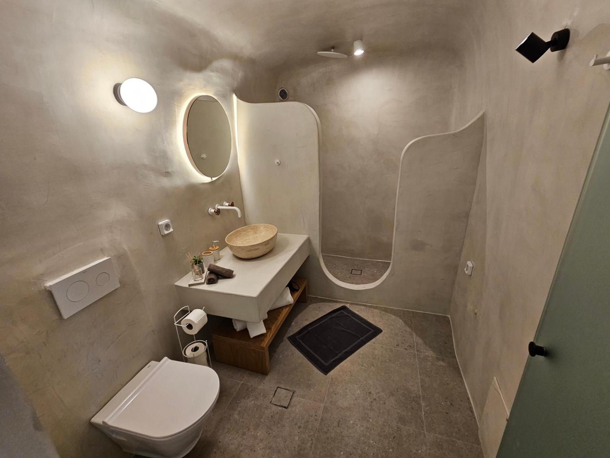 Petroma Cave Suites Vourvoulos Номер фото